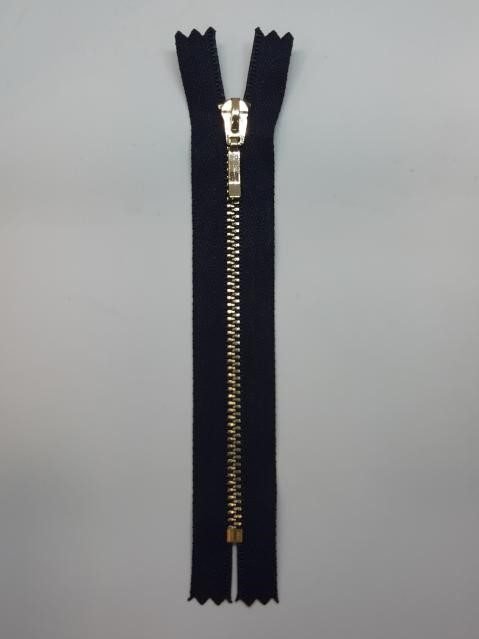 Cremallera azul marino 25 cms malla oro claro visible