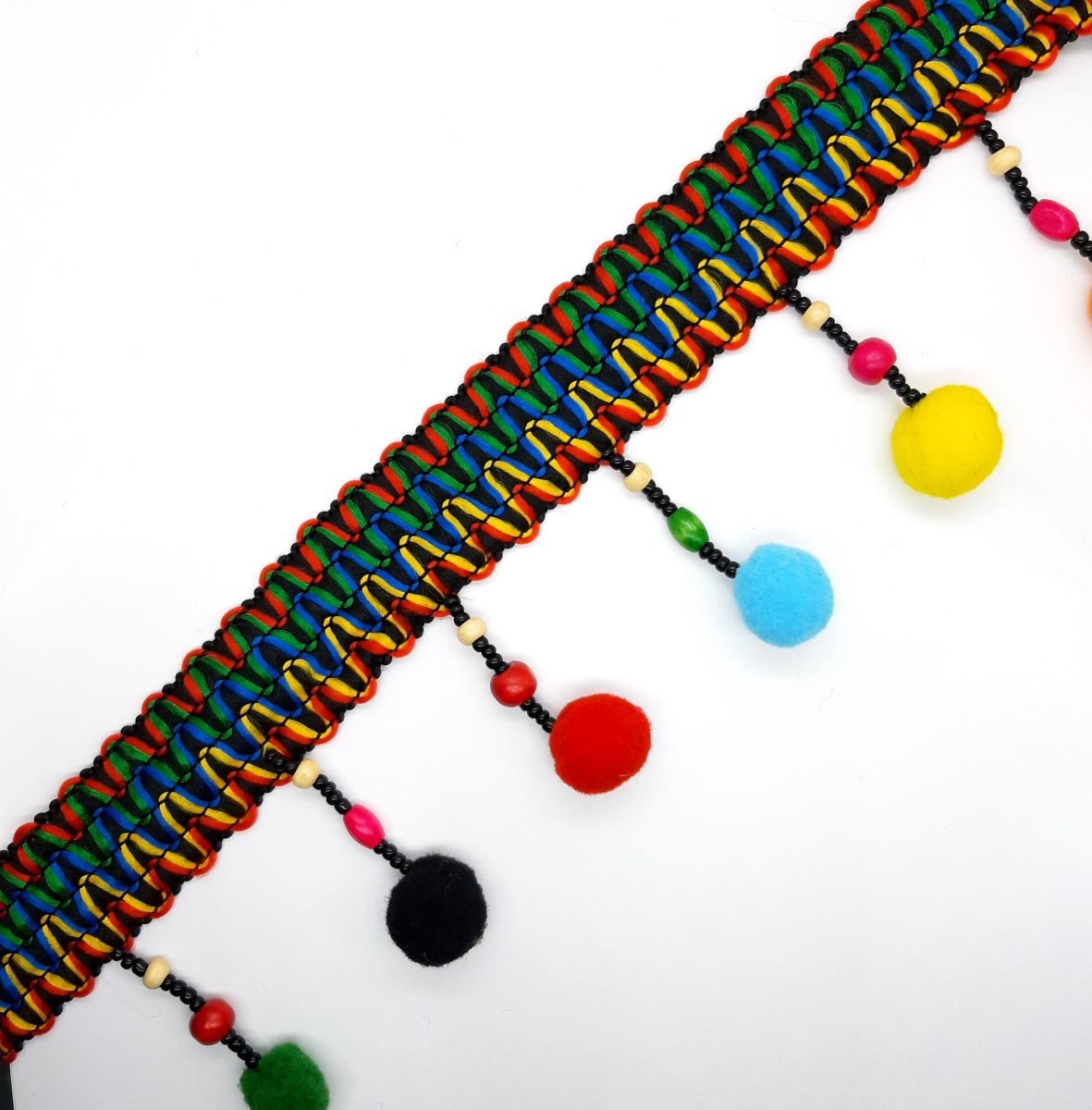 Galón madroño multicolor 8 cms. Fleco decorativo con rocalla y bolas de madera.