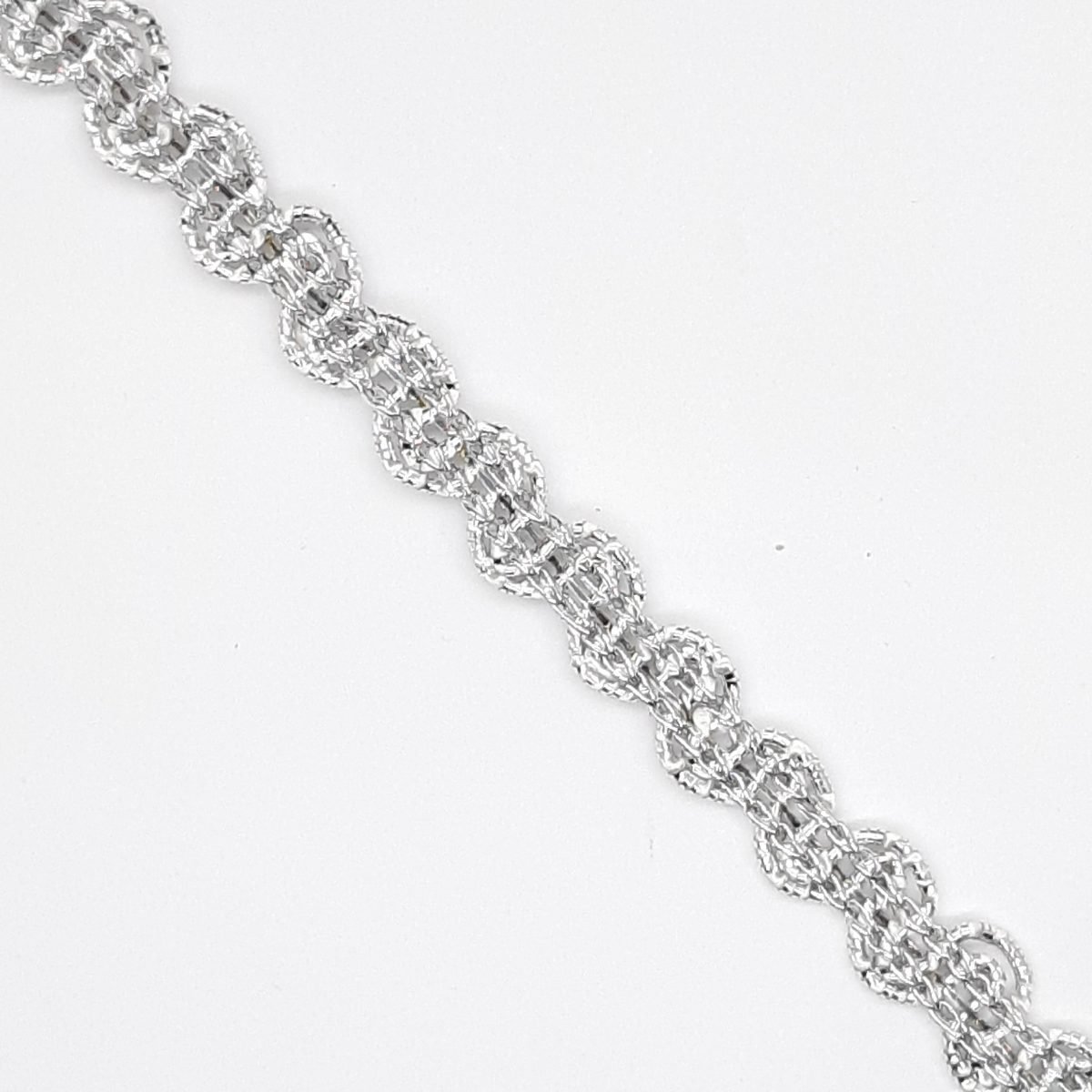 Galón pasamanería metalizada con ondas decorativas color plata