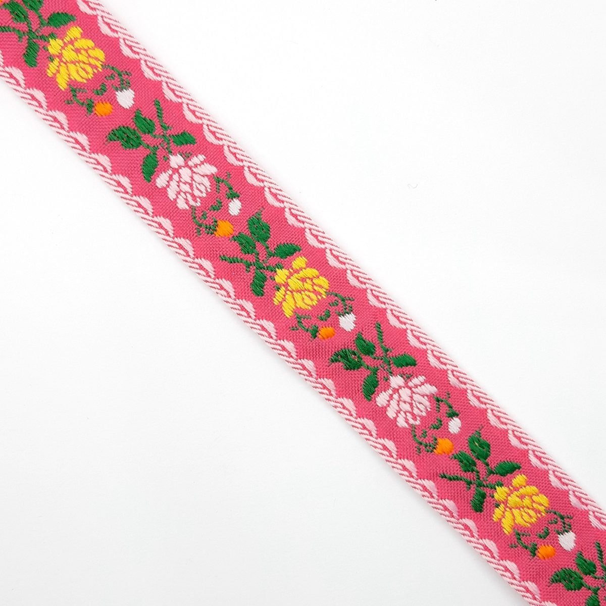 Galón tapacosturas flores 2,5 cms