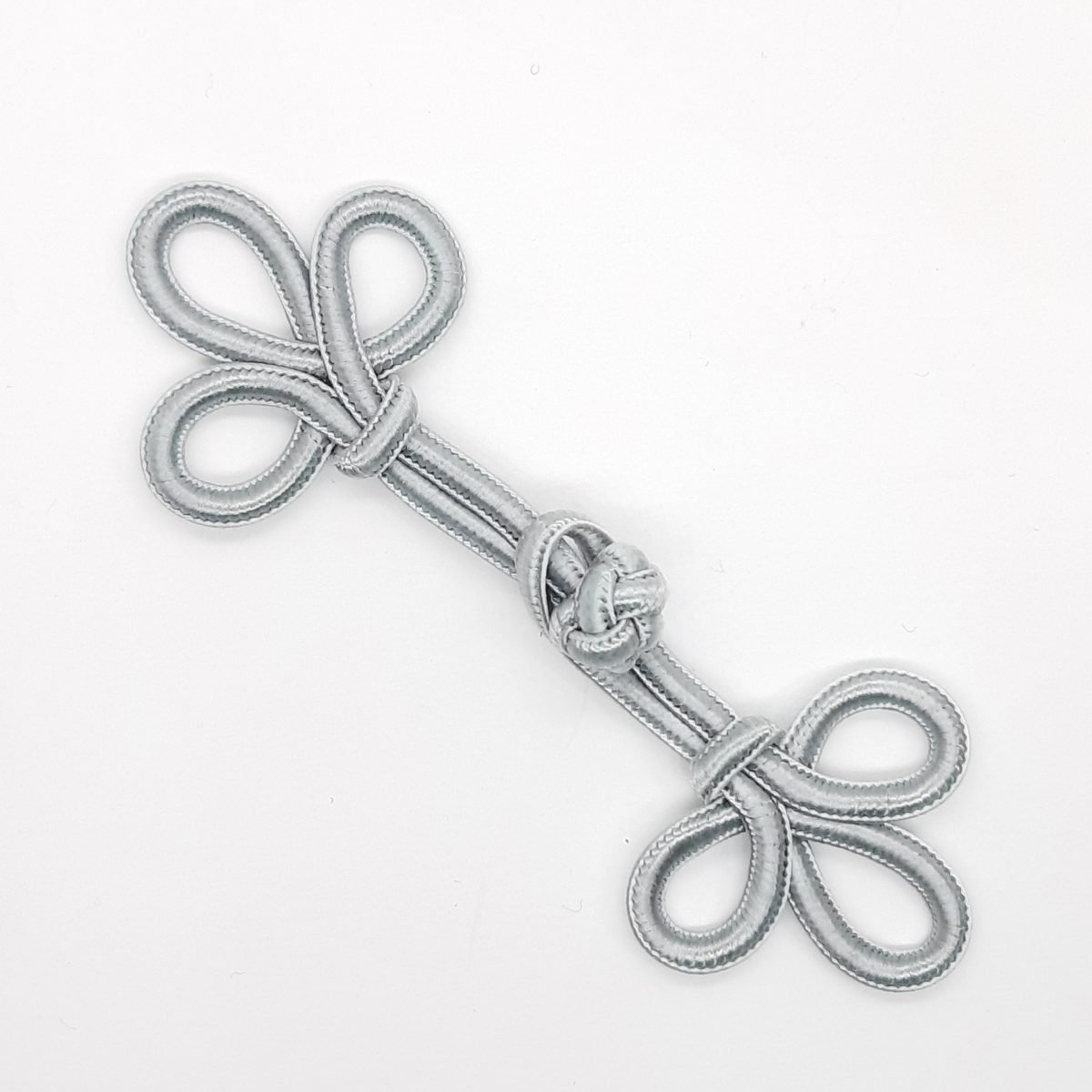 Broche cierre pasamanería gris