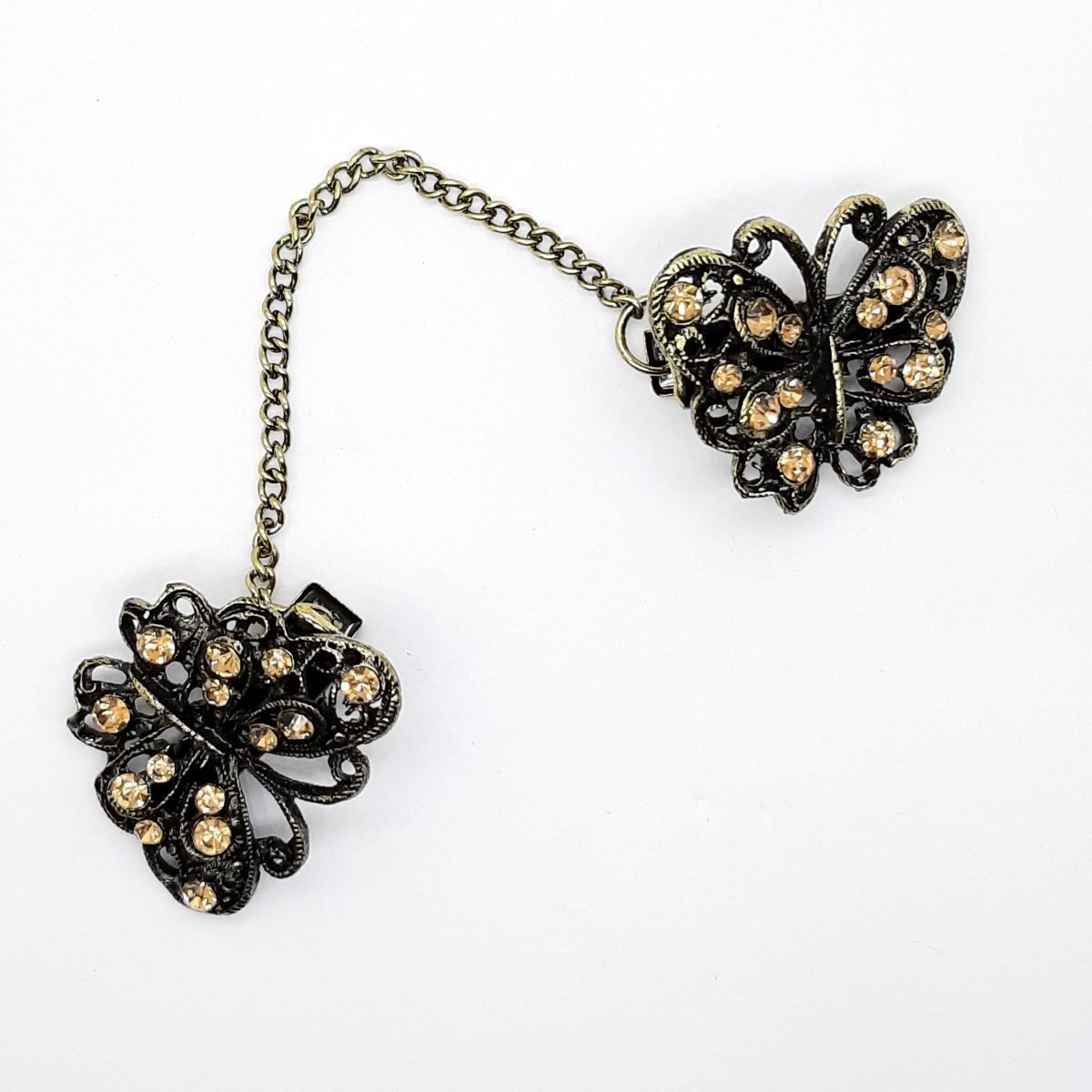Broche pinza de mariposas con cristal decorativo