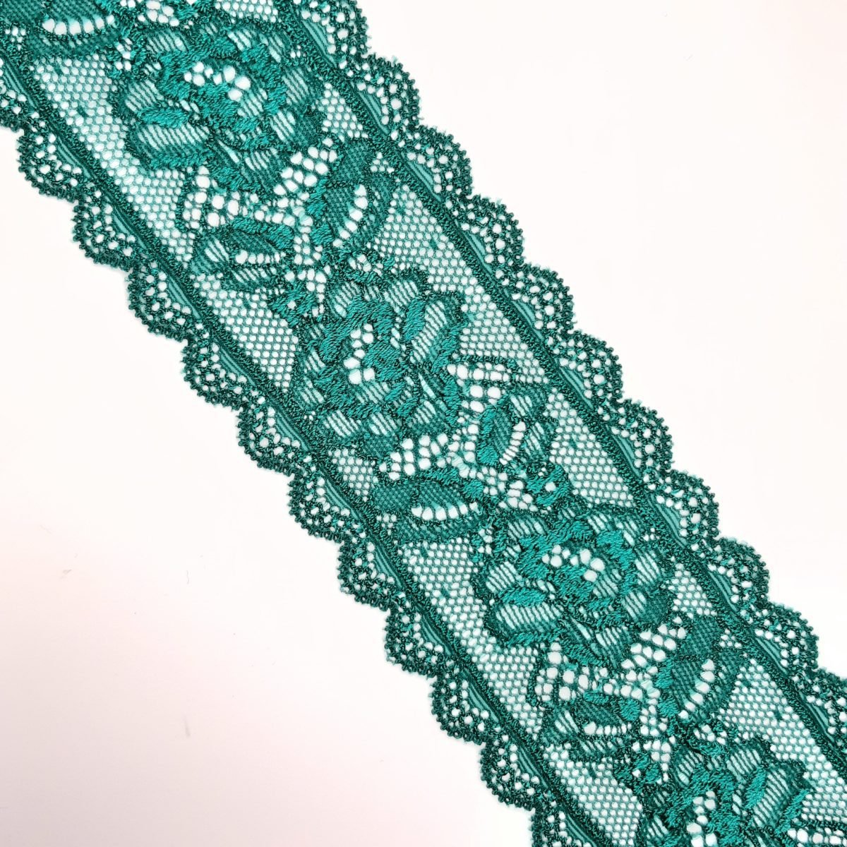 Entredos encaje elástico 5,8 cms verde botella