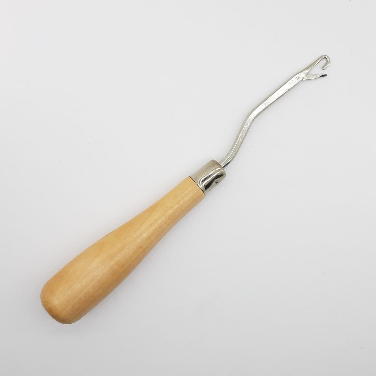 Aguja para tejer alfombras