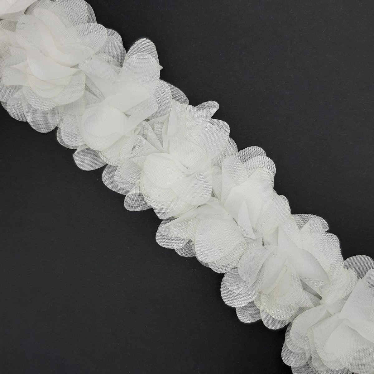 Tira flores organdí blanco
