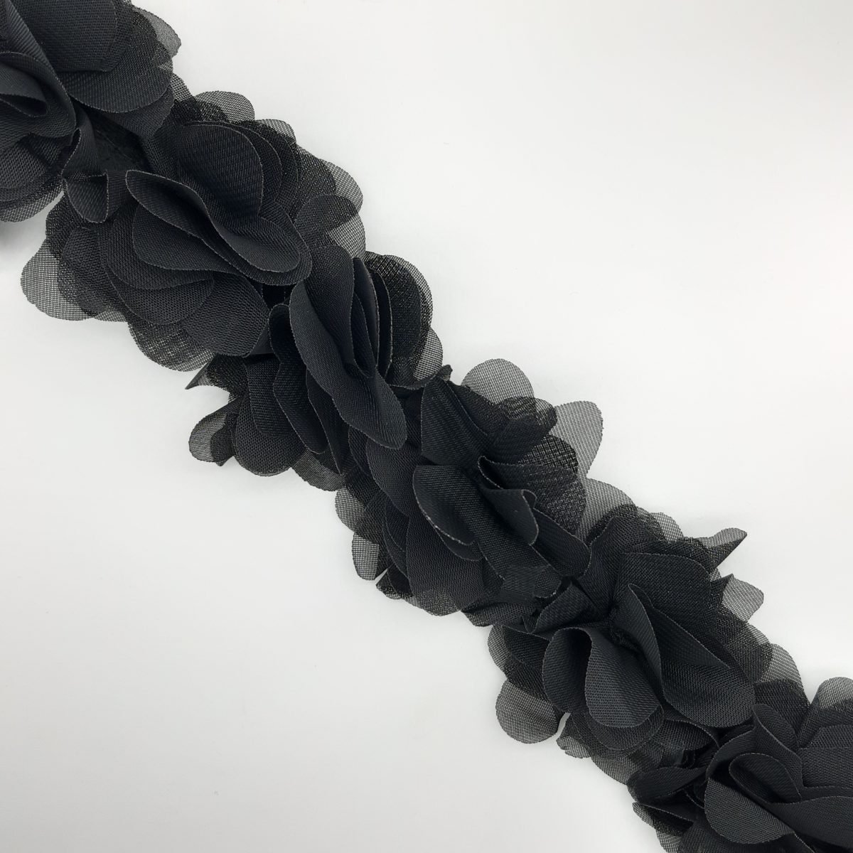 Tira flores organdí negro