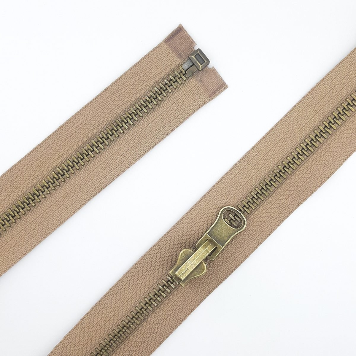 Cremallera reversible metálica 65 cms.