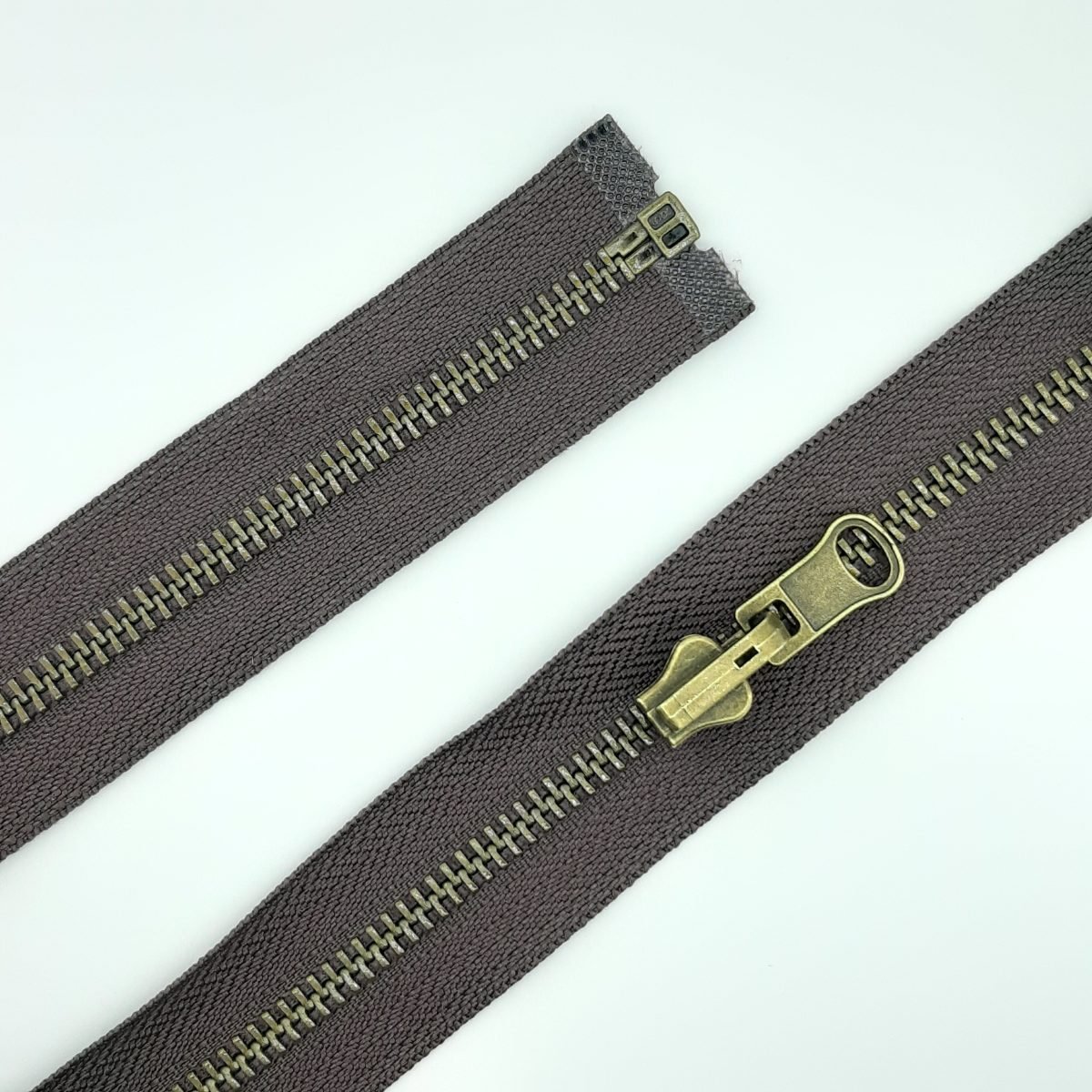 Cremallera reversible separador marrón.