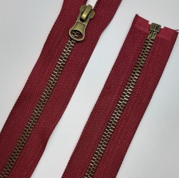 Cremallera metálica separador 65 cms malla oro viejo